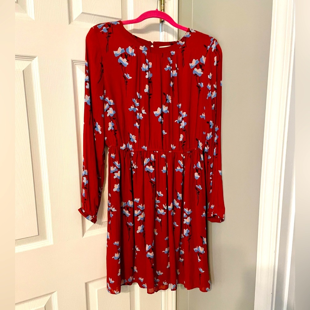 LOFT Long sleeved dress size medium. Red with blue flowers on it.